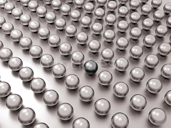 Black unique pearl among common ones in rows Stock photo © Arsgera