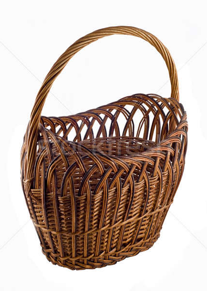 Brown woven basket over white Stock photo © Arsgera