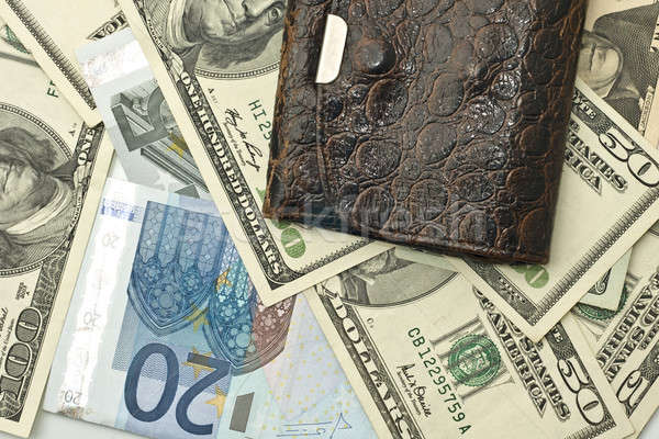 Stock photo: Saving the money - old wallet, US dollars