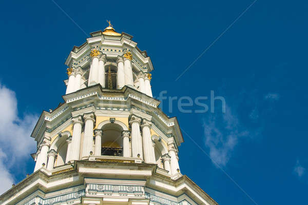  Bell tower and blue cloudy sky Stock photo © Arsgera