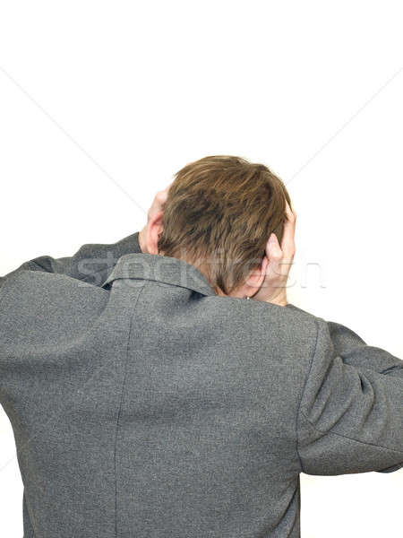 Trouble - Back of depressed businessman isolated Stock photo © Arsgera