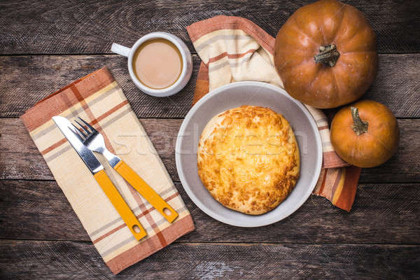 Pumpkins, coffee and flat cake on wooden table Stock photo © Arsgera
