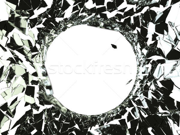Bullet hole and pieces of shattered or smashed glass Stock photo © Arsgera