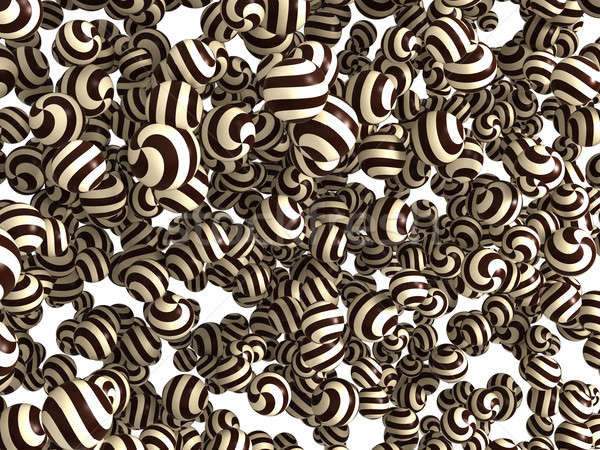 Striped chocolate bonbons over white  Stock photo © Arsgera