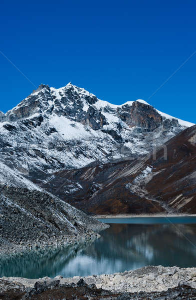 Mountain near Gokyo and Sacred lake in Himalayas Stock photo © Arsgera