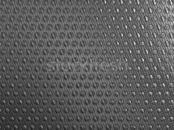 Carbon fibre background with round shapes Stock photo © Arsgera