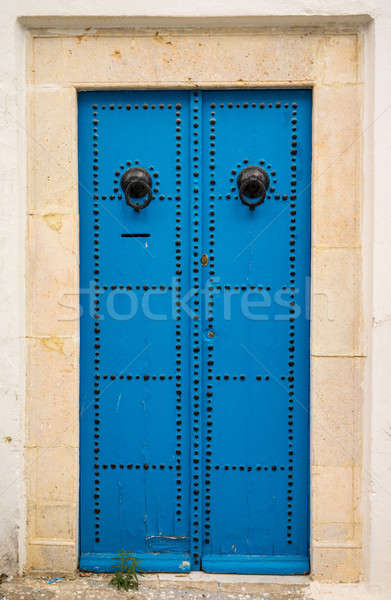 Aged traditional door with from Sidi Bou Said in Tunisia Stock photo © Arsgera