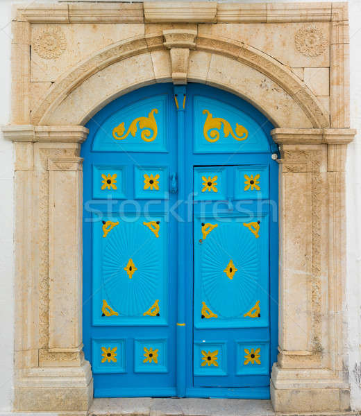 Blue door with ornament as symbol of Sidi Bou Said Stock photo © Arsgera