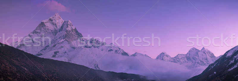 Ama Dablam peak and purple sunset in Himalayas Stock photo © Arsgera