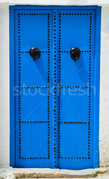 Blue traditional door from Sidi Bou Said in Tunisia Stock photo © Arsgera