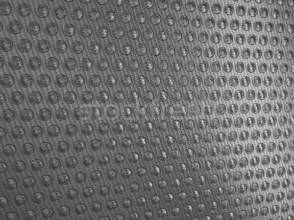 Carbon fibre surface with round shapes Stock photo © Arsgera