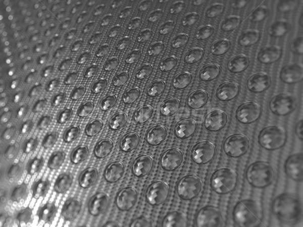 Carbon fibre surface with round shapes pattern Stock photo © Arsgera