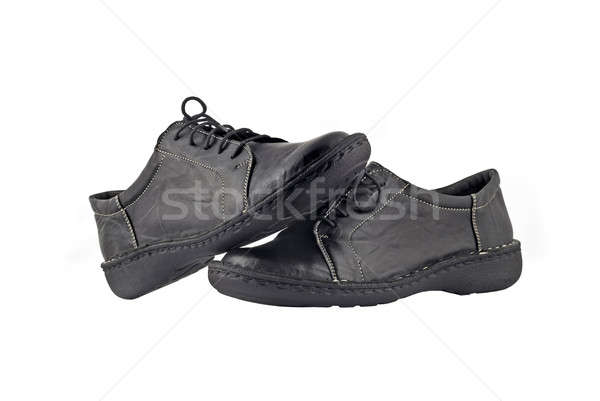 Black women's leather shoes over white Stock photo © Arsgera