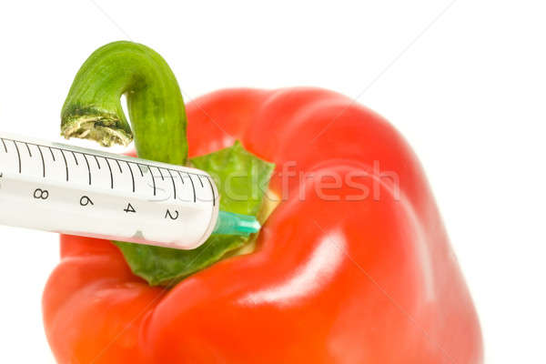 Genetically modified products - pepper and syringe Stock photo © Arsgera