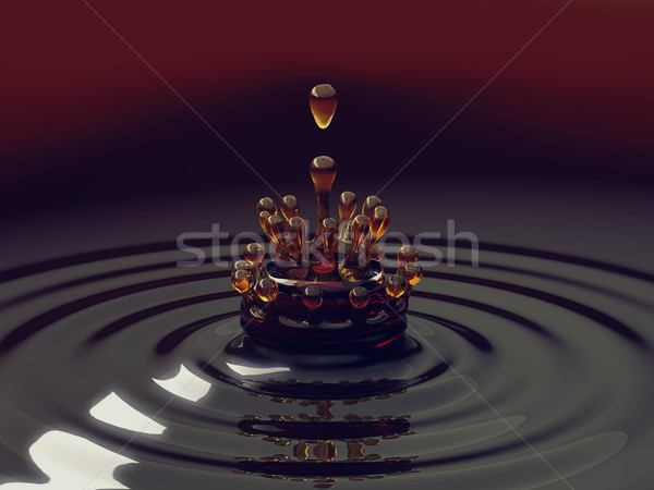 Splash of colorful liquid with droplets Stock photo © Arsgera