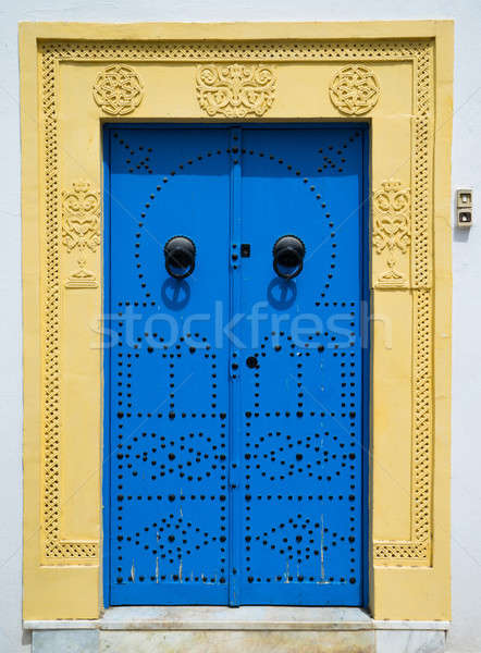 Blue door with ornament from Sidi Bou Said in Tunisia Stock photo © Arsgera