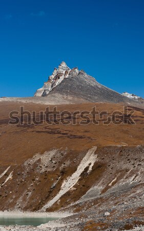 Mountain summits and rocks in Himalayas Stock photo © Arsgera