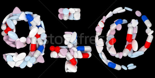 Pills font 9 plus minus and at symbols Stock photo © Arsgera