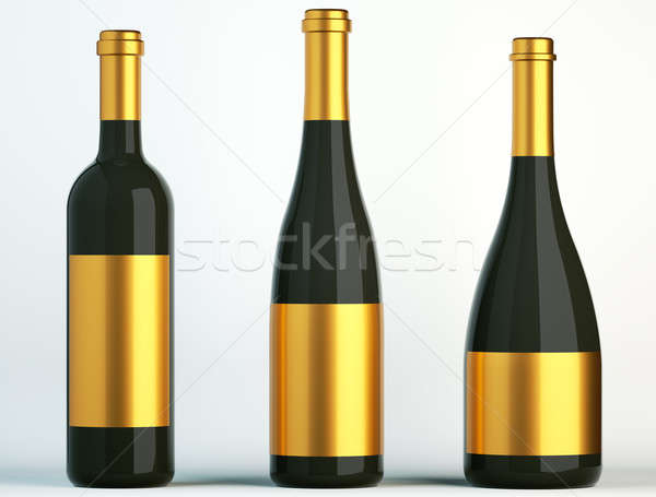 Three black bottles for wine with golden labels  Stock photo © Arsgera