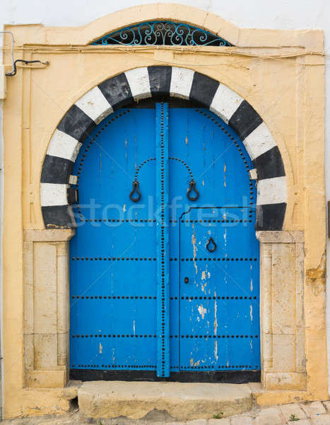 Traditional blue arched door from Sidi Bou Said Stock photo © Arsgera