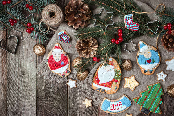 Christmas pastry and decorated cookies in rustic style Stock photo © Arsgera