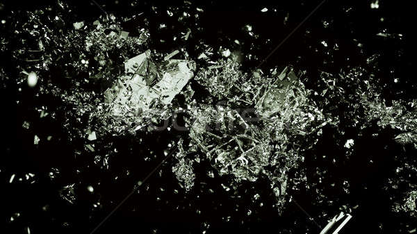 Pieces of splitted or cracked glass on black Stock photo © Arsgera