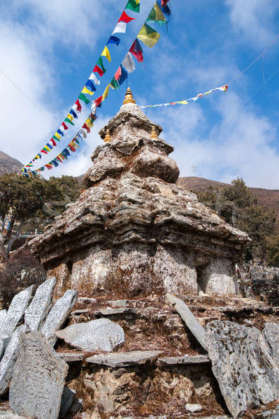 Buddhism stupa or chorten with prayer flags in Himalayas Stock photo © Arsgera