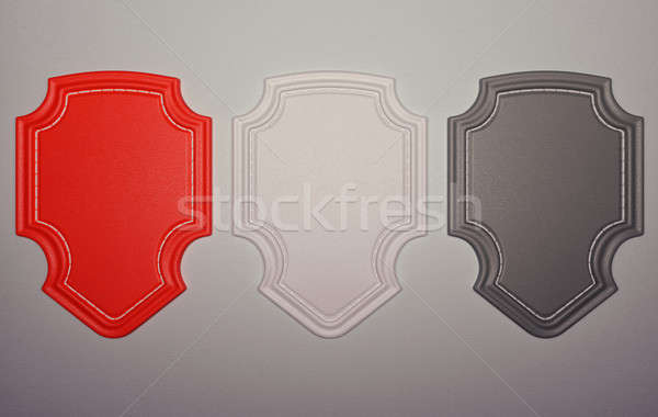 Three labels or tags over grey leather background Stock photo © Arsgera