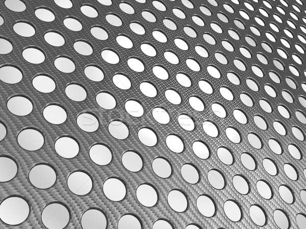 Carbon fibre surface perforated  Stock photo © Arsgera