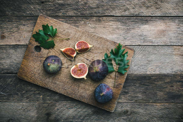Stock photo: Ripe Figs on chopping board and wood