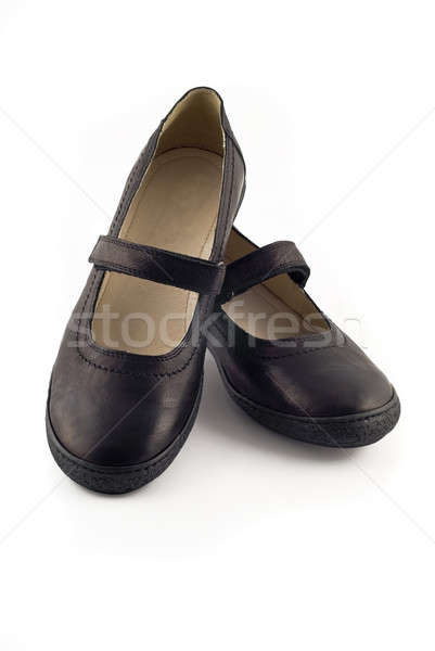 Modern women's leather shoes over white Stock photo © Arsgera