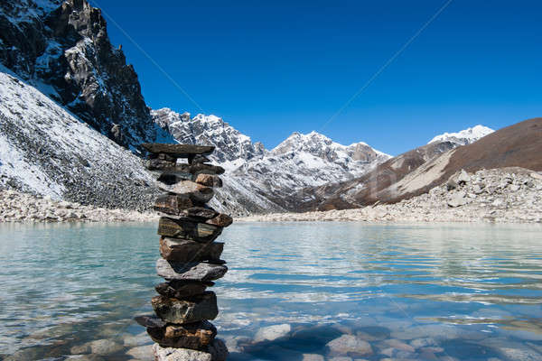 Harmony: Stone stack and Sacred Gokyo Lake Stock photo © Arsgera