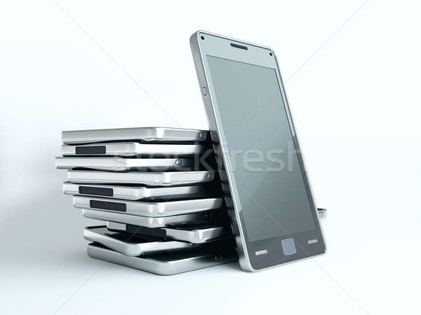 Gadgets: cellphones with touch screens over white Stock photo © Arsgera