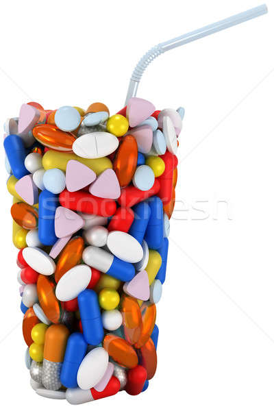 Glass shape assembled of pills with straw Stock photo © Arsgera