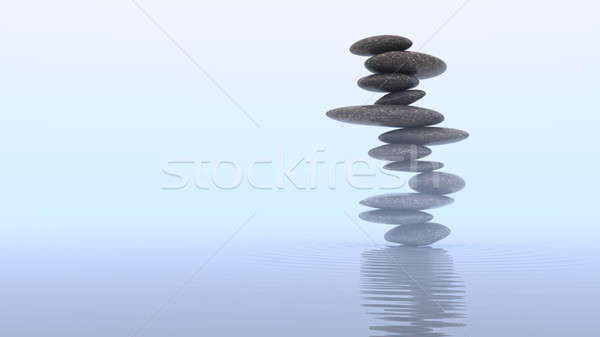 Mist and Plie of Pebbles on water Stock photo © Arsgera