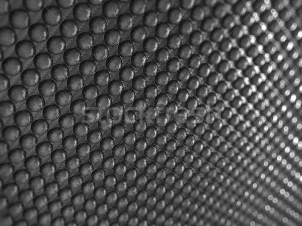Pimply Carbon fibre with shallow DOF Stock photo © Arsgera