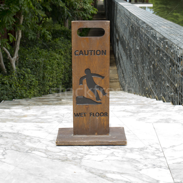 Caution wet floor wooden sign board Stock photo © art9858