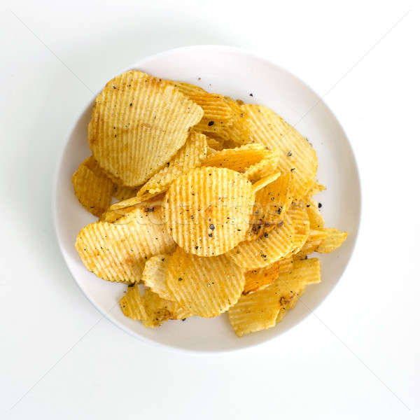 Potato chips isolated on white background Stock photo © art9858