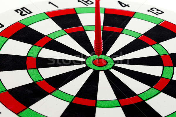 One darts in center of target isolated on white Stock photo © art9858