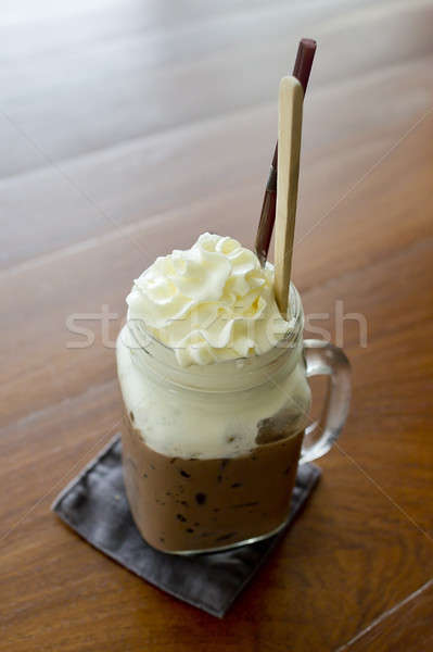 Ice chocolate with whipped cream on table Stock photo © art9858