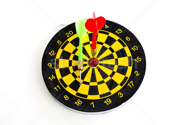 Two darts in center of target isolated on white Stock photo © art9858