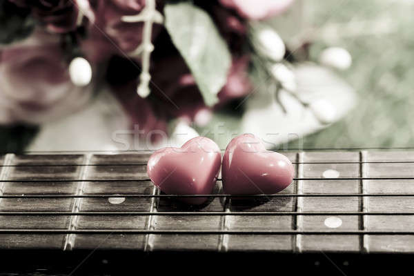 heart on neck guitars and strings on the grass Stock photo © art9858