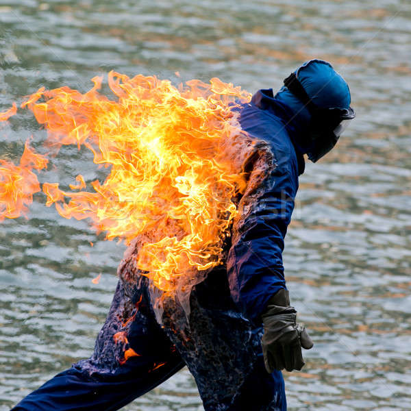 Man on fire Stock photo © art9858