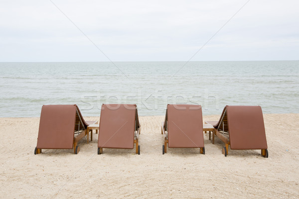 Beach chair on sand beach. Concept for rest, relaxation, holiday Stock photo © art9858