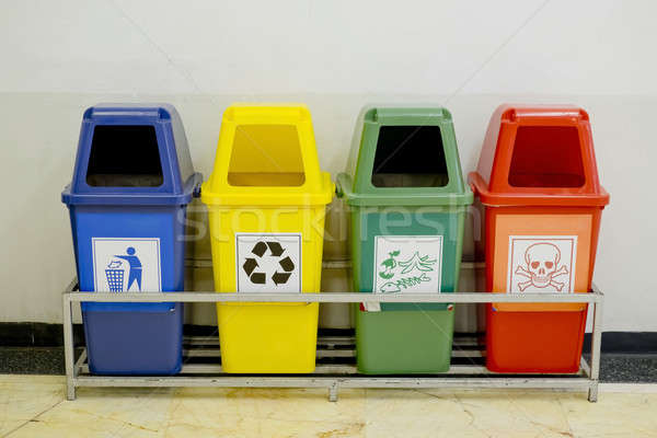 Stock photo: Different Colored wheelie bins set with waste icon