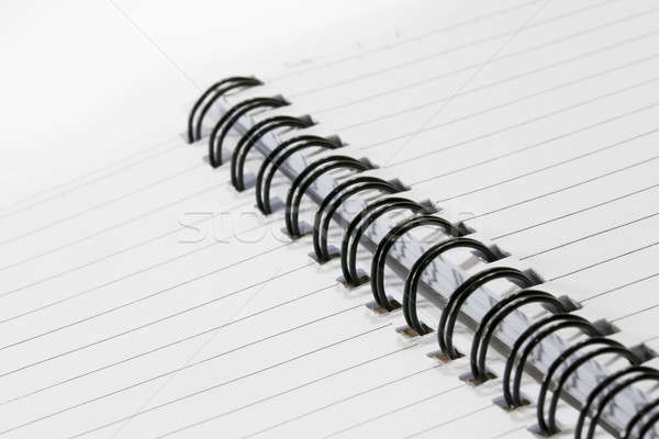 Close up of a spiral bound notebook with black spirals Stock photo © art9858