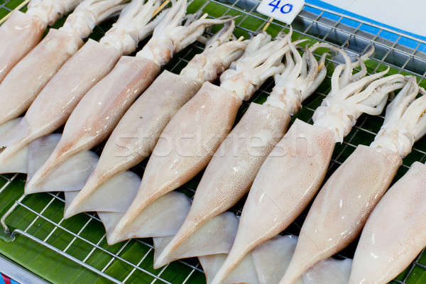 BBQ Squid on a Stick. grilled buttered fresh squid ready to eat Stock photo © art9858