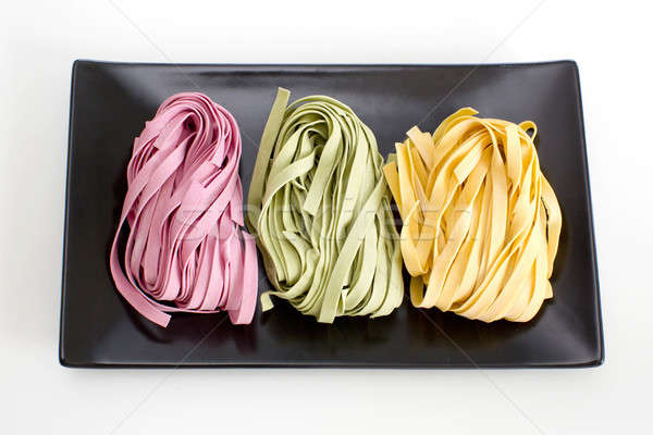 Bundles of dried ribbon color  pasta Stock photo © art9858