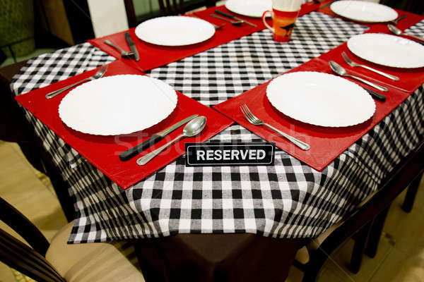 Reserved sign on a table in restaurant Stock photo © art9858