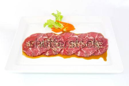 Assorted Fresh Cured Meats on white dish isolate Stock photo © art9858